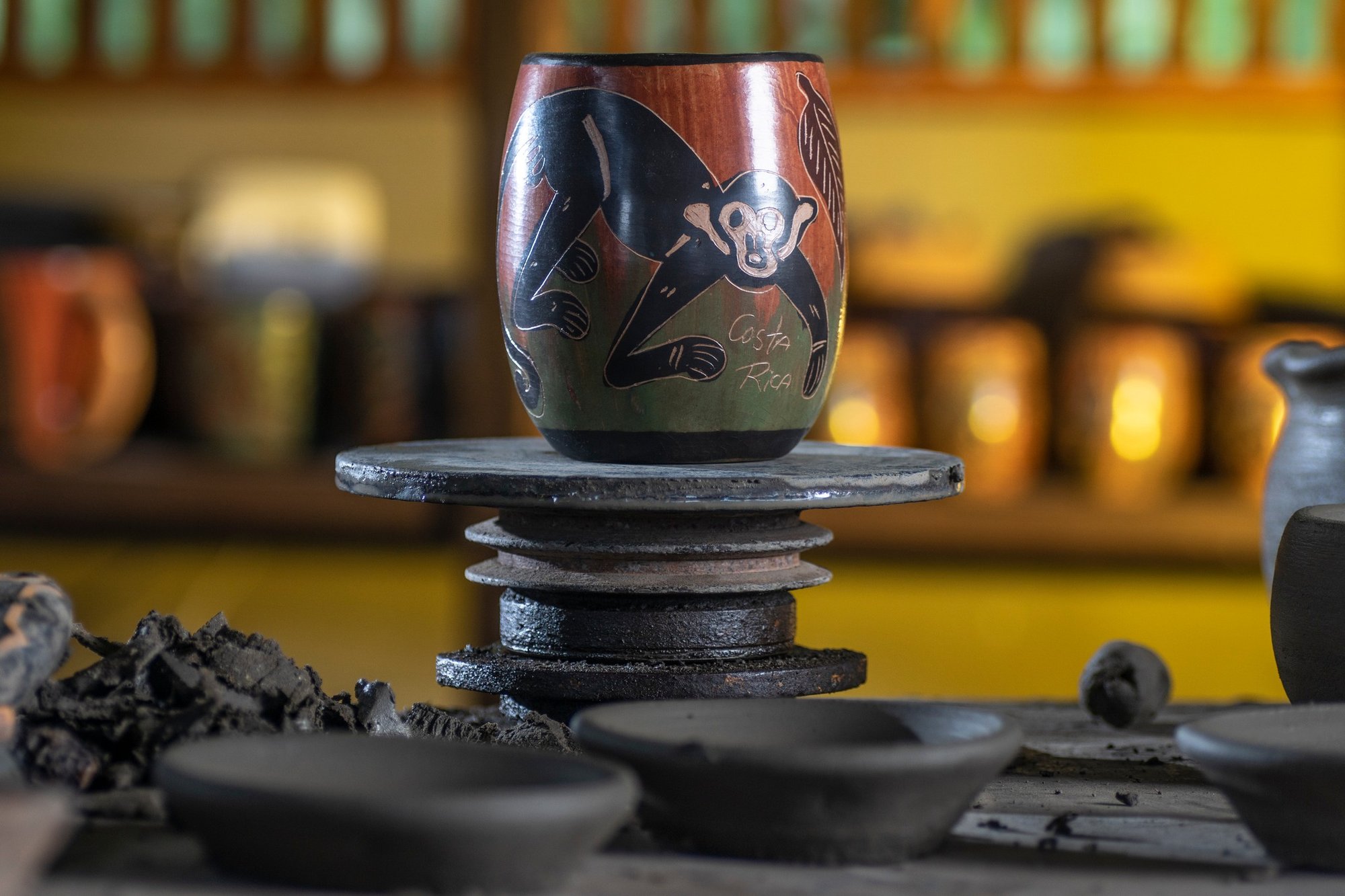 Hand-carved pottery on a potter's wheel