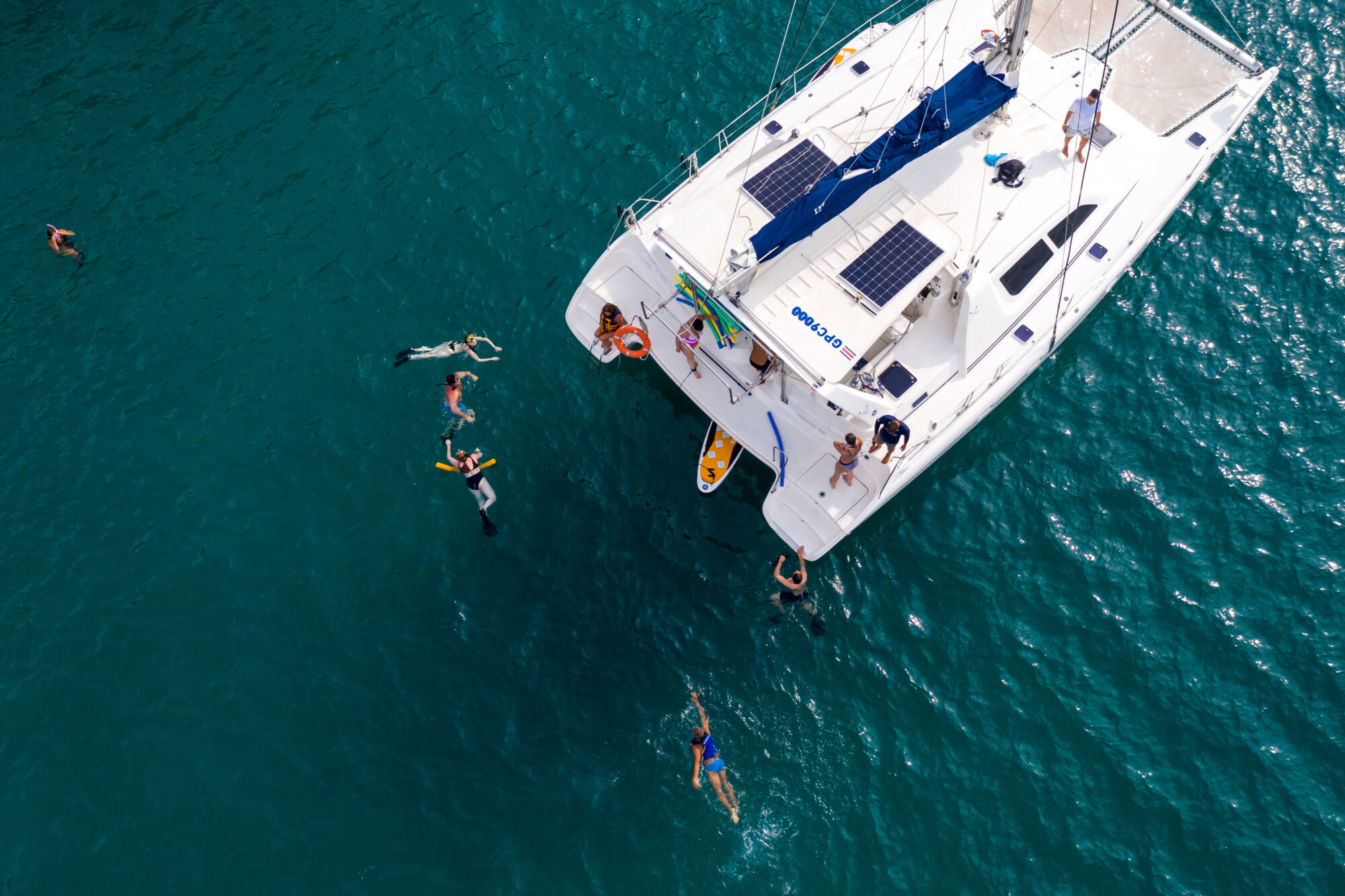 Snorkeling beside a catamaran in Guanacaste